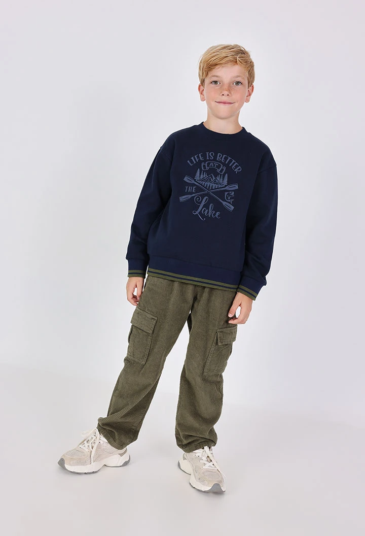Green stretchy trousers for boy
