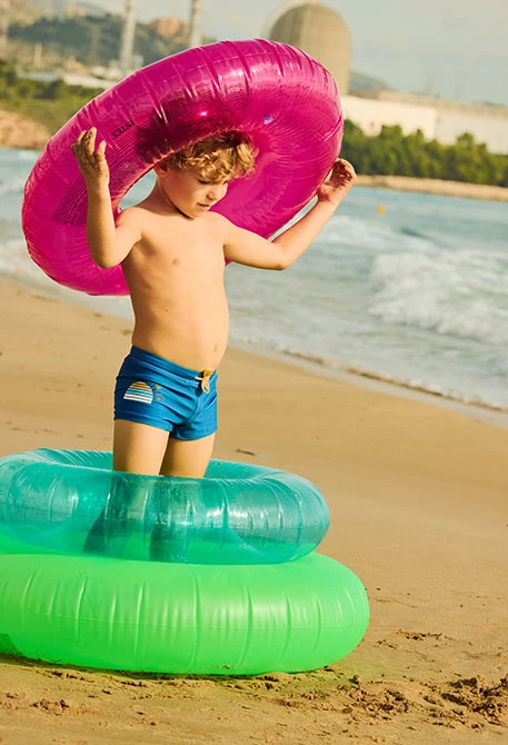 Costume da bagno a righe blu e arancioni per bambino UPF50+