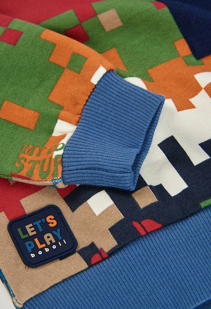Sweatshirt em felpa para menino azul com estampado de píxeis