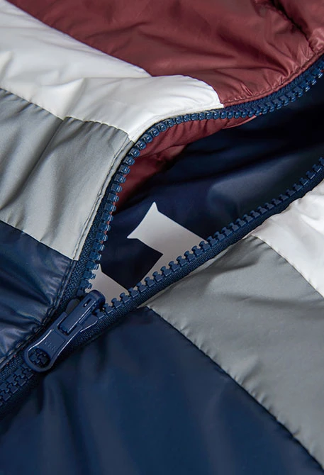 Reversible parka for boys in navy blue and red