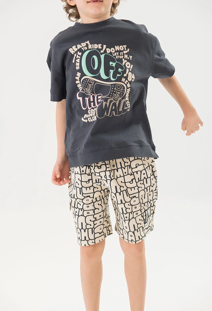 Knit shorts for boy with cream-coloured print