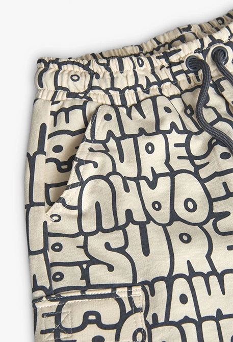 Bermudas de malha para menino com estampado em cor creme