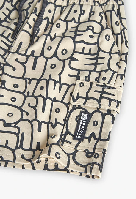 Bermudas de malha para menino com estampado em cor creme