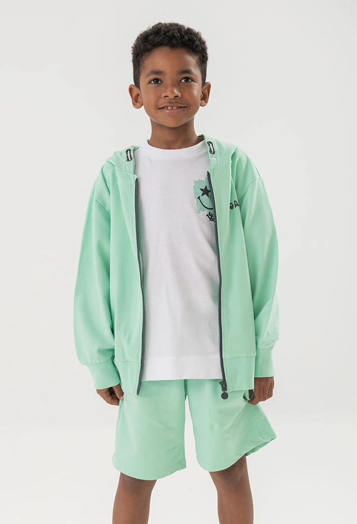 Bermuda in maglia per bambino di colore verde