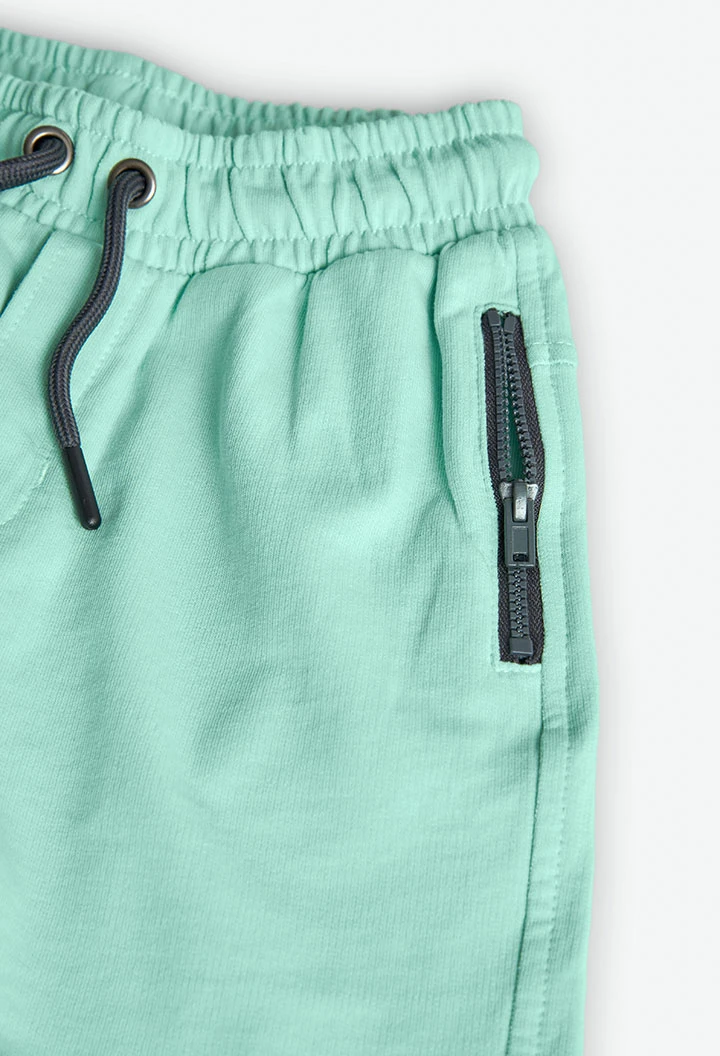 Bermuda in maglia per bambino di colore verde