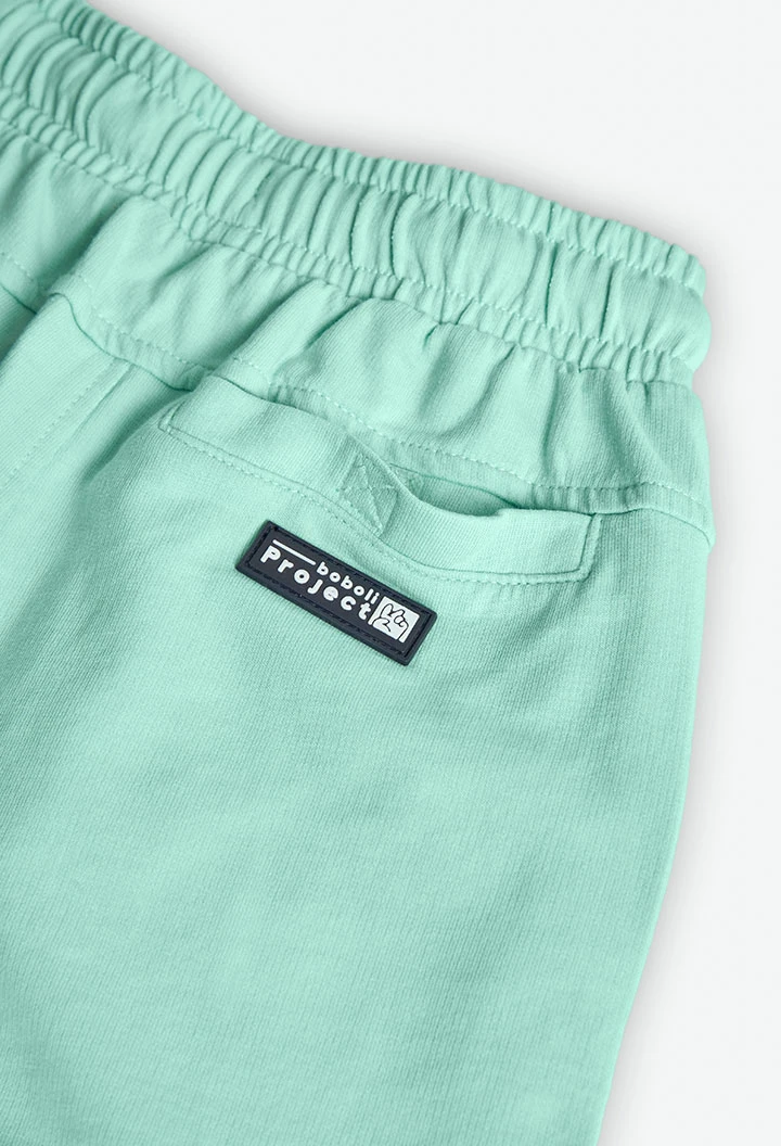 Bermuda in maglia per bambino di colore verde