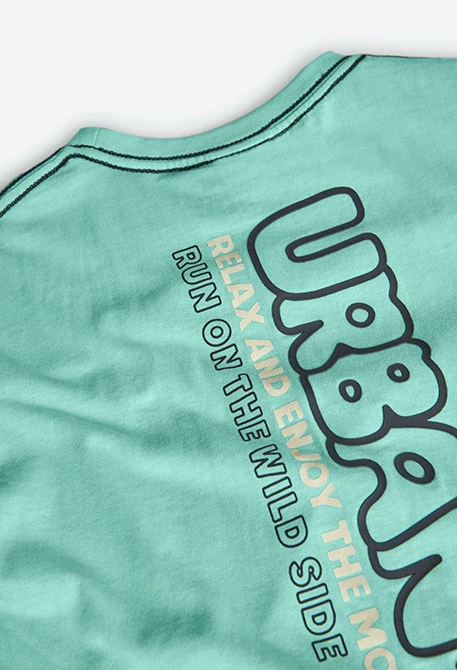 T-shirt per bambino in maglia di colore verde acqua