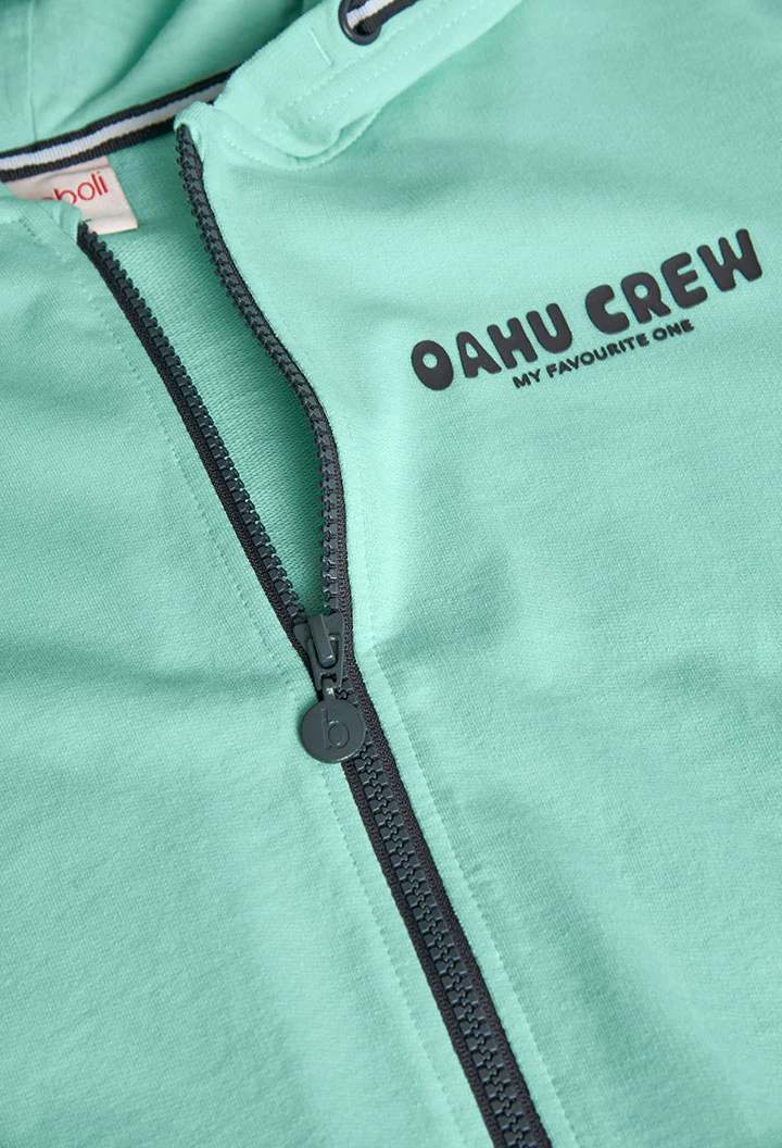 Veste en molleton pour garçon de couleur verte.