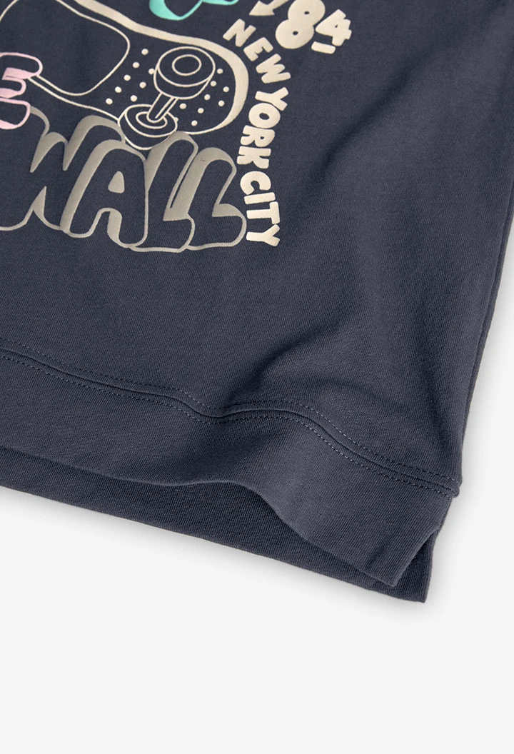 Maglietta in maglia per bambina di colore grigio.