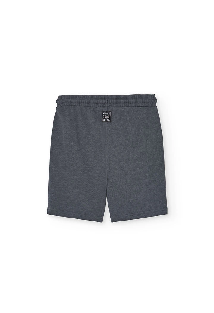 Boys\' knit set consisting of a white T-shirt and grey shorts.
