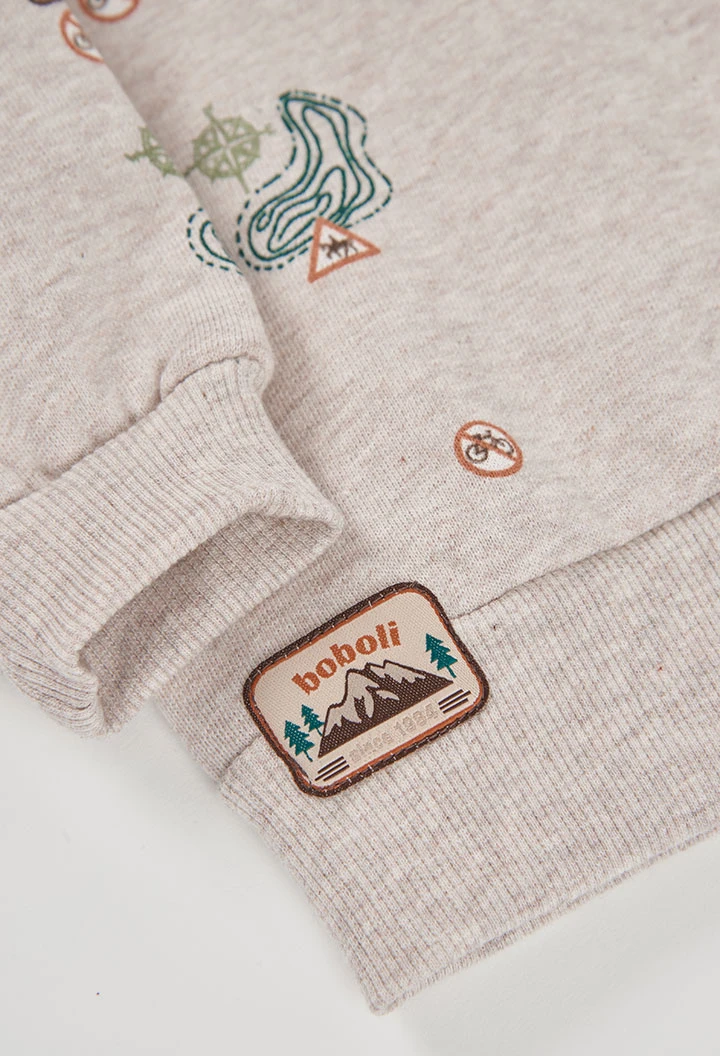 Sudadera felpa niño beige estampado aventura