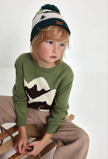 Maglione bambino verde stampato con sciatori