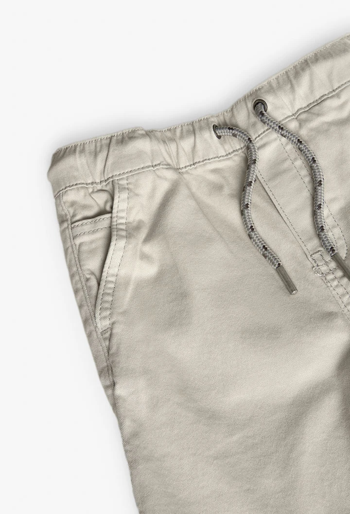 Elastic twill Bermuda shorts for boys in beige colour