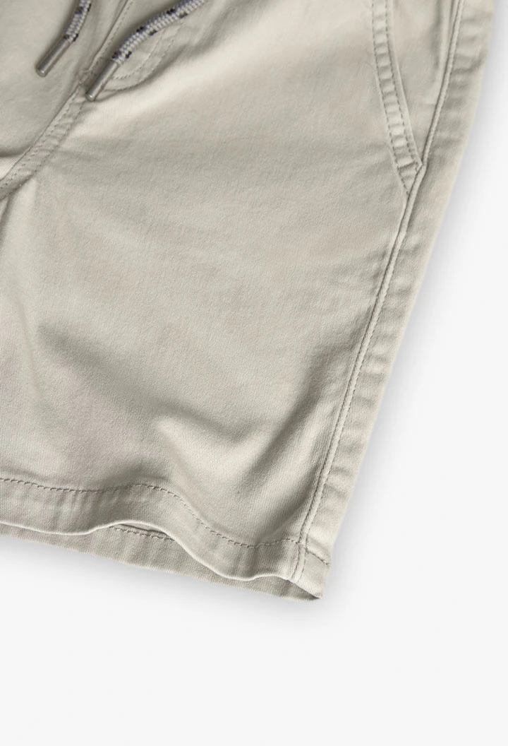 Elastic twill Bermuda shorts for boys in beige colour