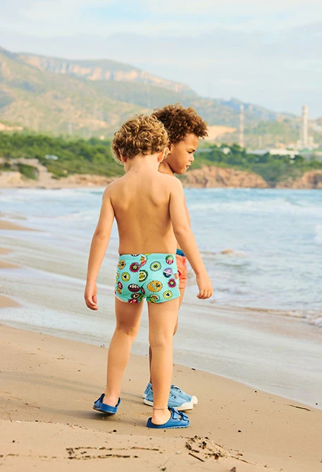 Costume da bagno bambino azzurro acqua stampato UPF50+