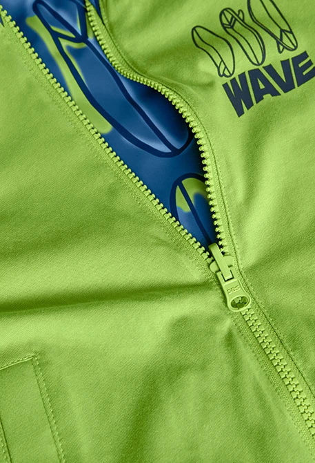 Parka revserible punto para niño con estampado en color azul y verde