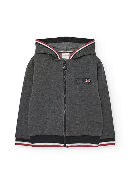 Veste garçon en maille noire à bordure rouge et blanche