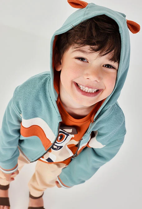 Grüne Strickjacke für Kinder