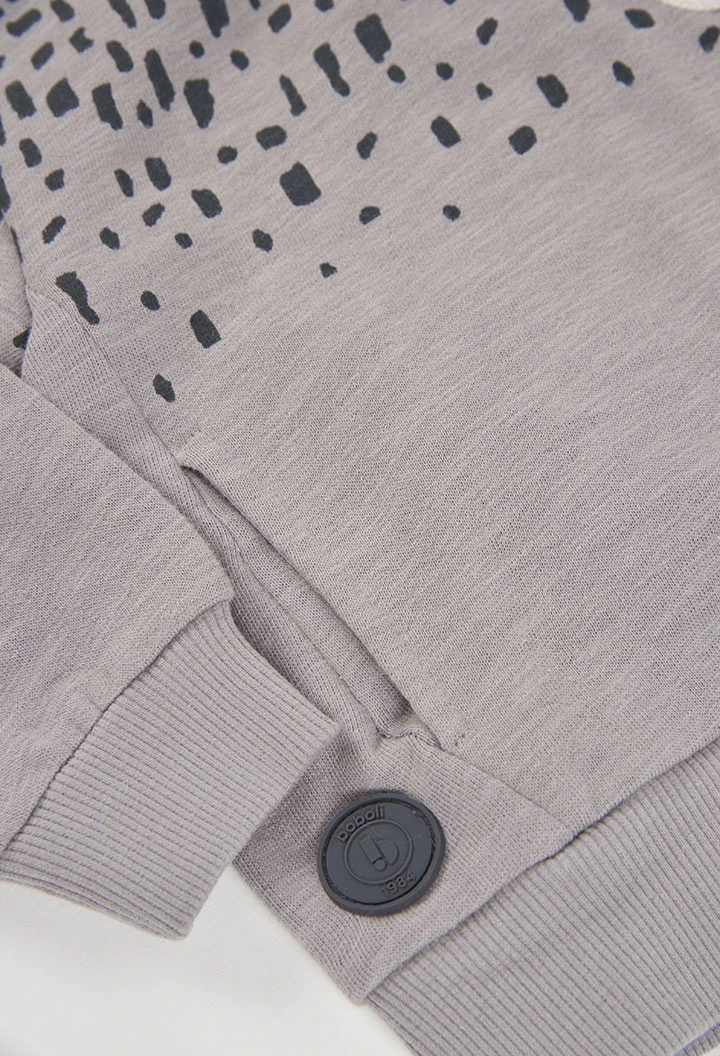 Dessuadora de pelfa nen gris amb caputxa estampada