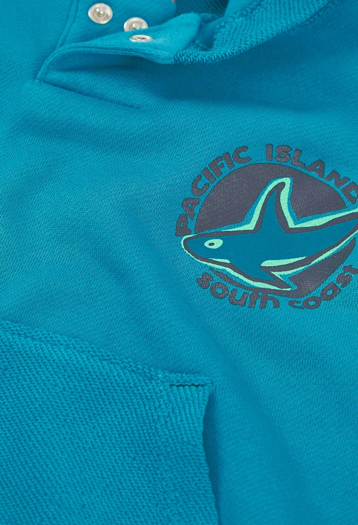 Dessuadora de tirants nen blau aigua