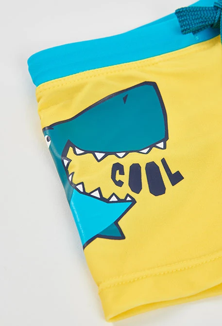 Fato de banho verde com estampado de animais para menino