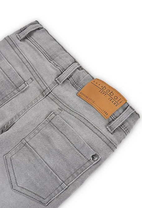 Calças denim elástica para menino