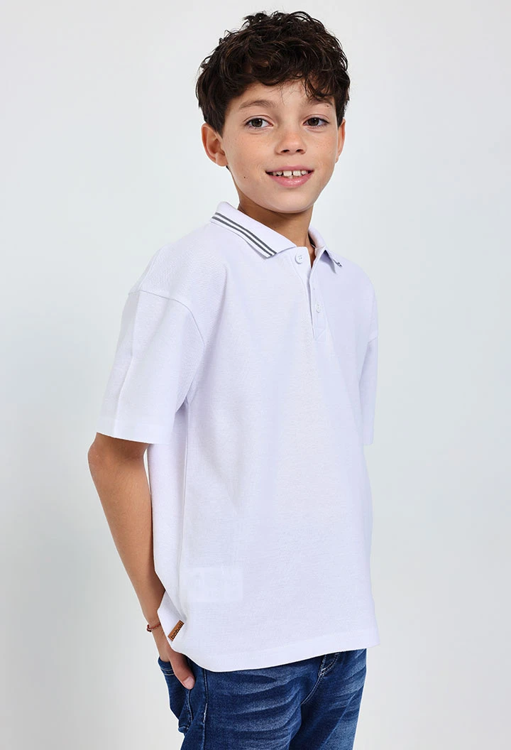 Polo in piqué da bambino colore bianco