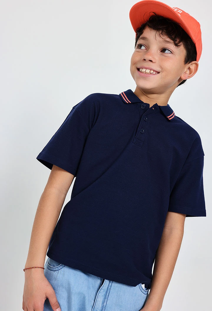 Boy\'s navy blue piqué polo shirt