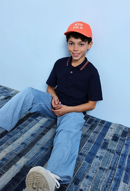 Boy\'s navy blue piqué polo shirt