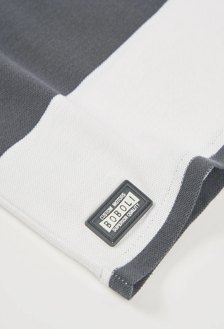 Polo enfant en coton noir et blanc