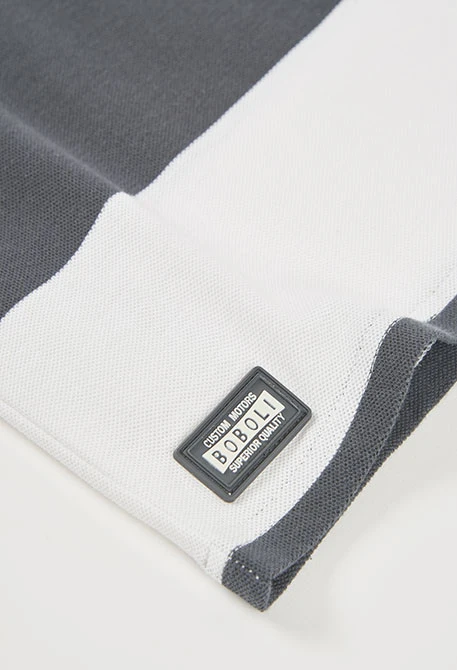 Polo enfant en coton noir et blanc