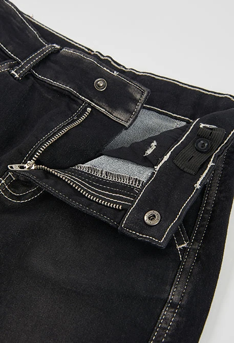 Pantalón denim niño negro con costuras blancas