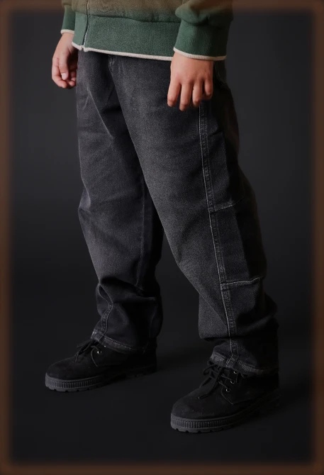 Black denim trousers for boys with white stitching