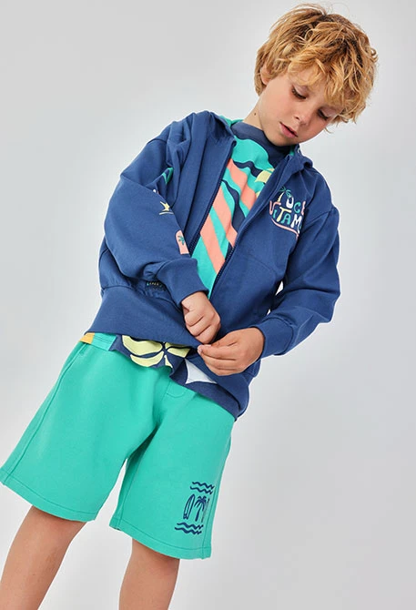 Children?s jacket with hood in blue cotton