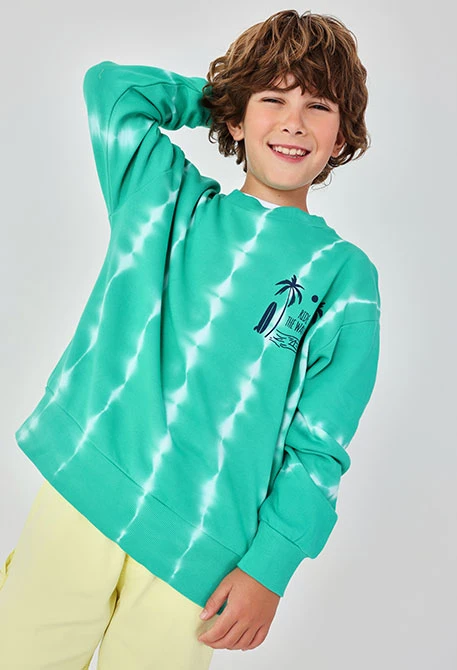 Sweat-shirt enfant en peluche verte.