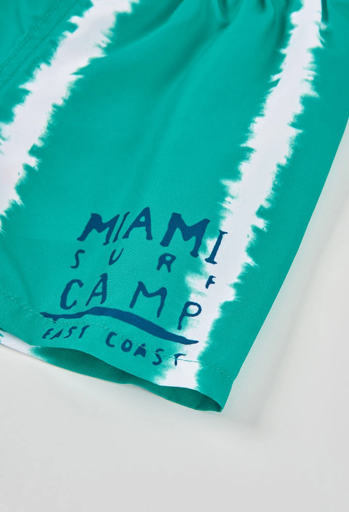 Boy?s green swimsuit made from recycled fabric