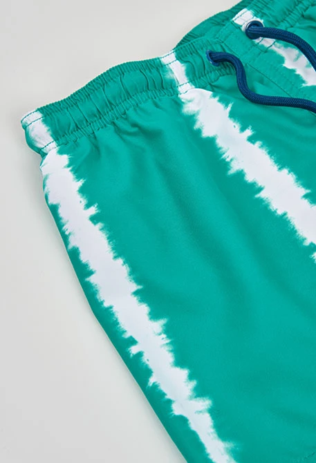 Boy?s green swimsuit made from recycled fabric