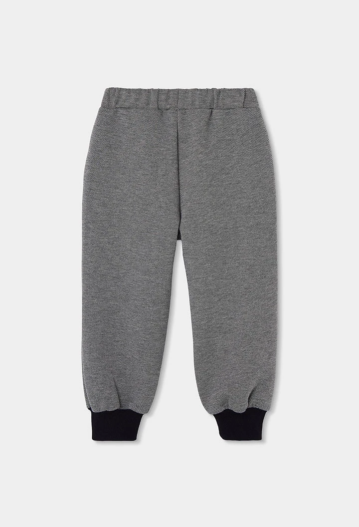 Pantalone in maglia nera da bambino con tasche a cerniera