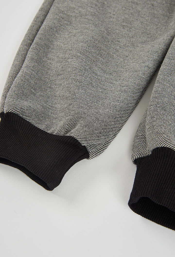 Pantalón punto negro niño con bolsillos cremallera