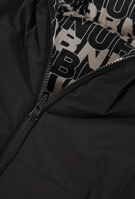 Parka tejido técnico reversible niño estampado letras negro