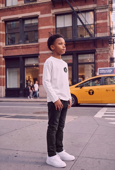 Boys´ black elastic denim trousers
