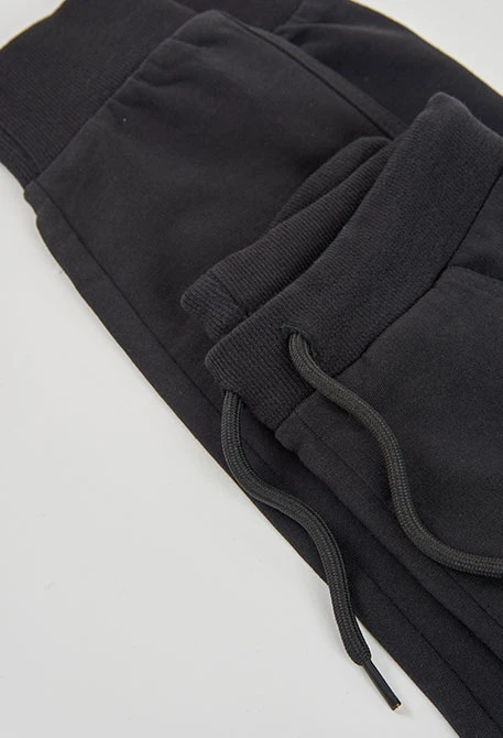 Schwarze Plüschhose für Jungen