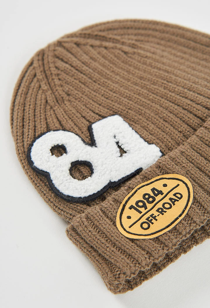 Green cap with shield patches
