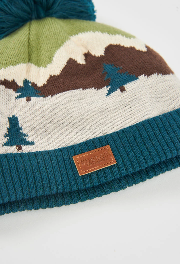 Mountain print green hat with pompom