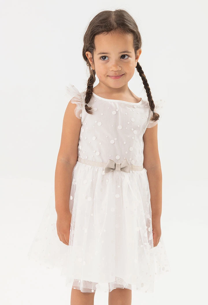 Robe en tulle pour bébé fille avec motif à pois en couleur blanche.