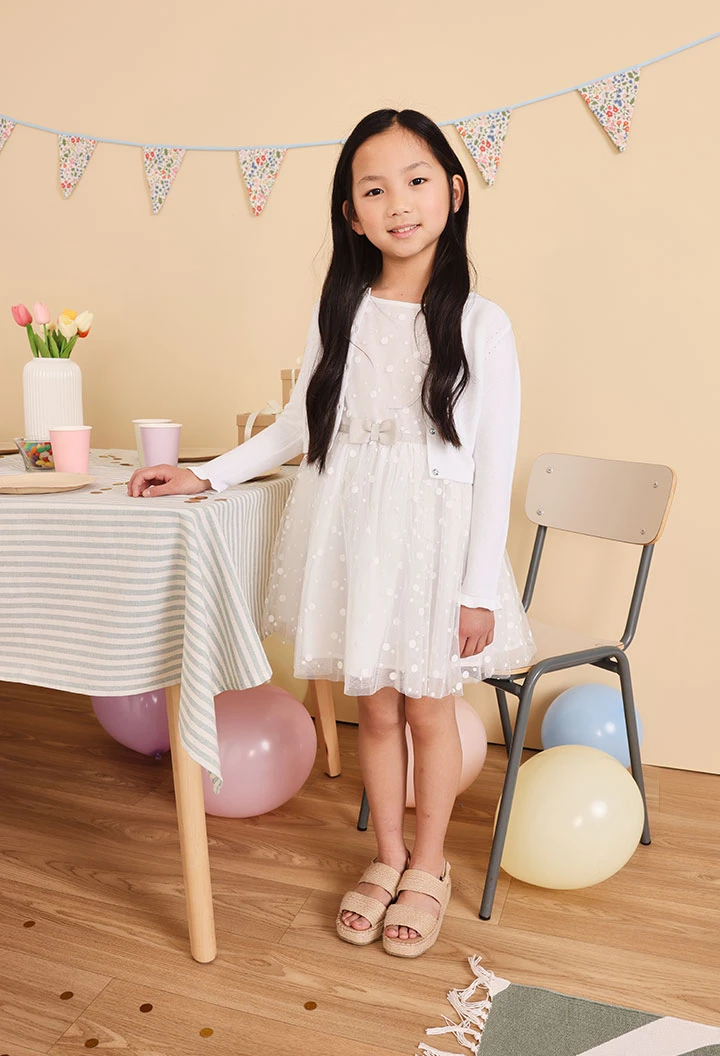 Baby girls tulle dress with a polka dot design in white colour