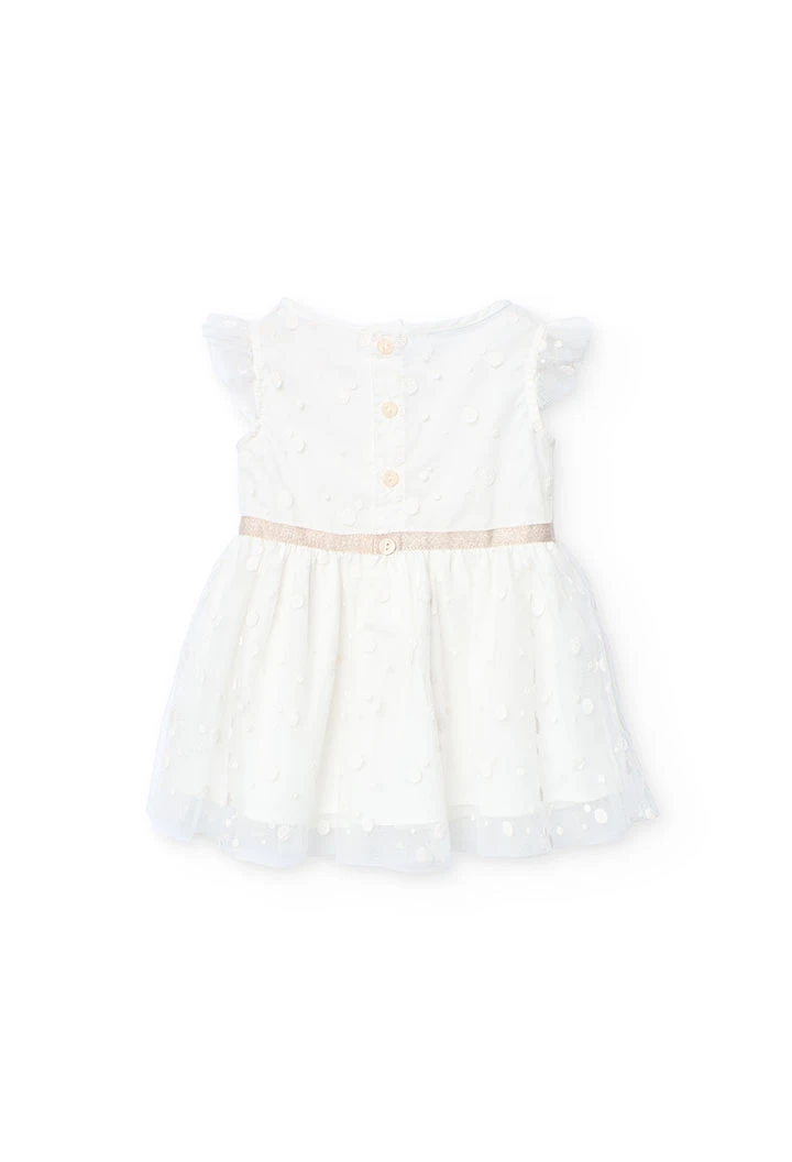 Robe en tulle pour bébé fille avec motif à pois en couleur blanche.