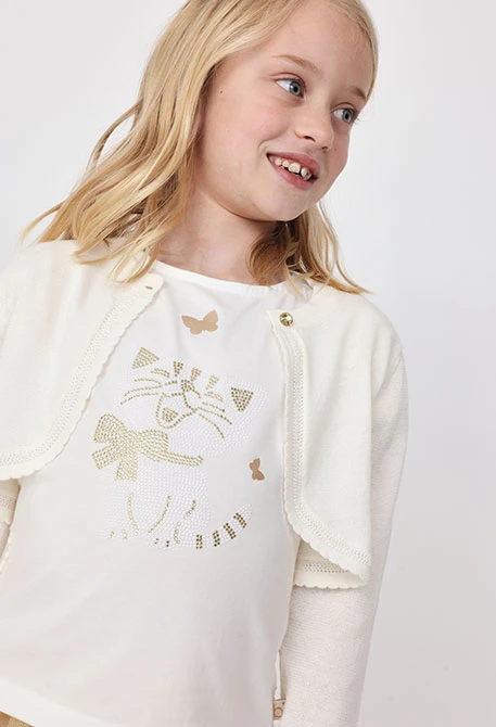 Bolero in maglia per neonata in bianco.