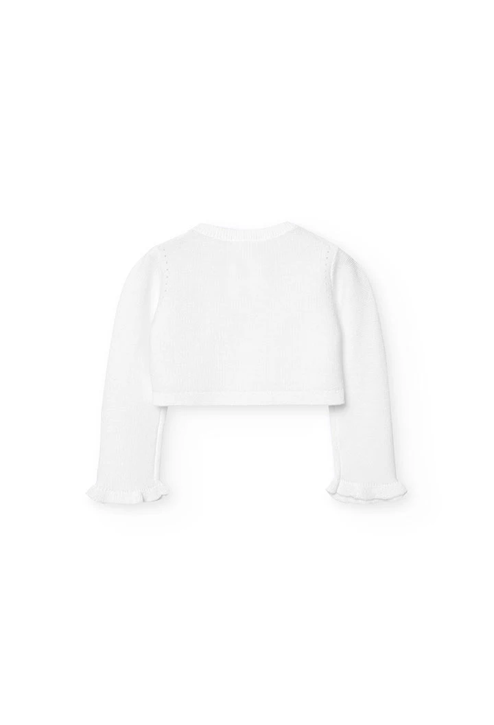 Veste en tricot pour bébé fille de couleur blanche.