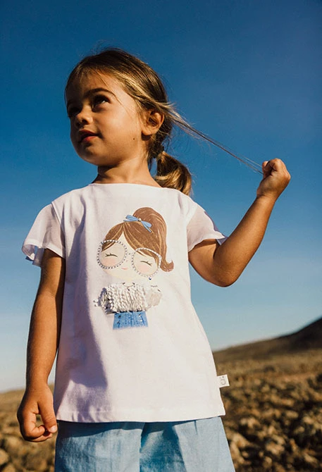 Maglietta in maglia elastica per bambina di colore bianco